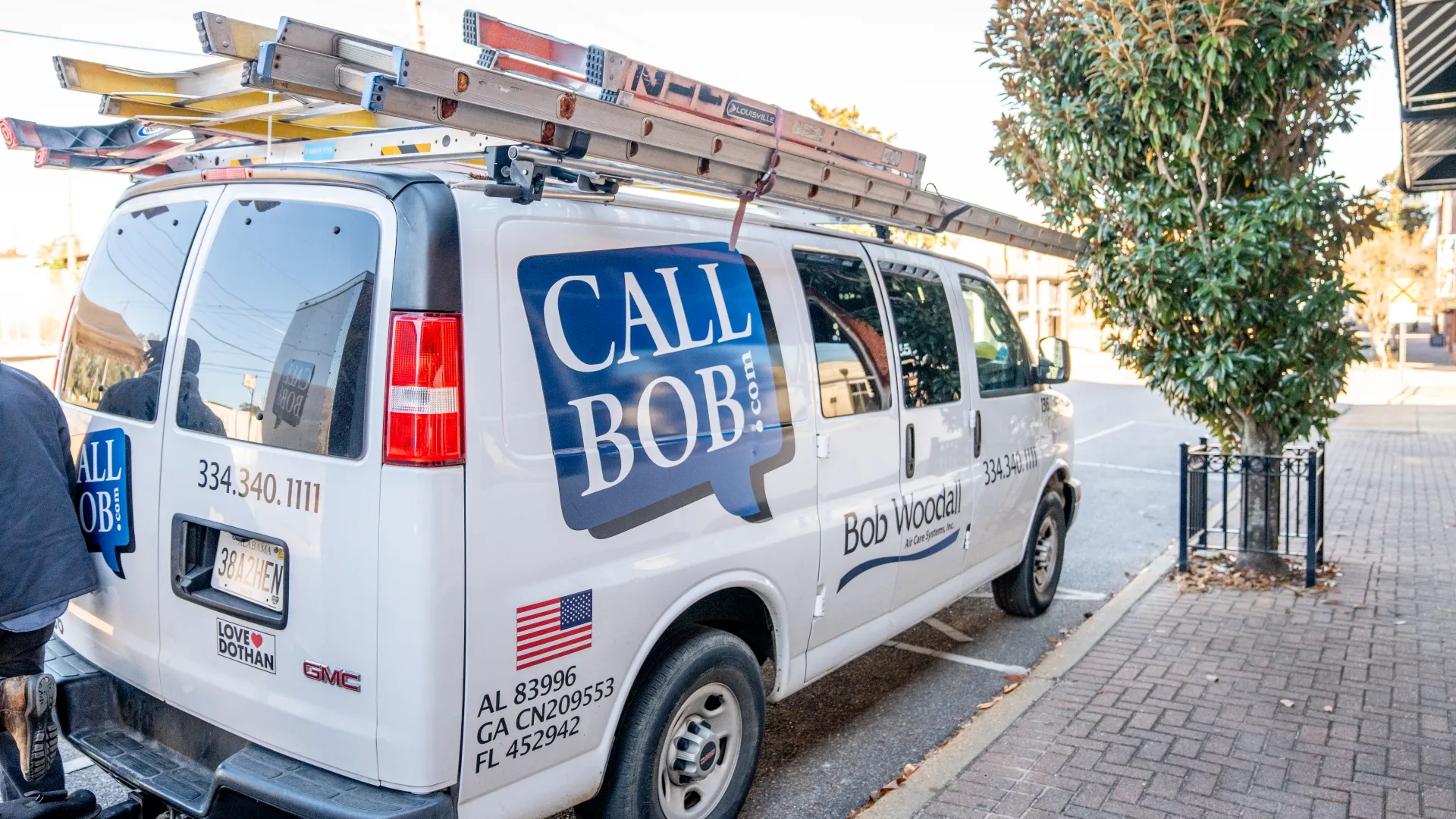 a white van with blue lettering