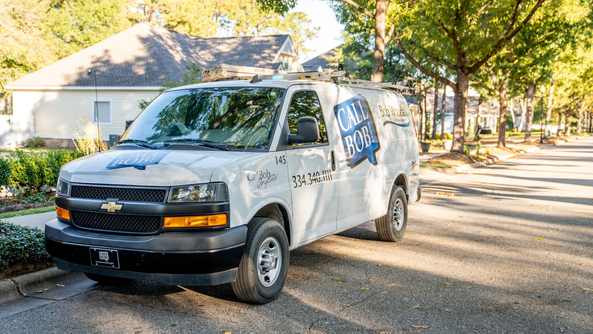 a van parked on the side of a road