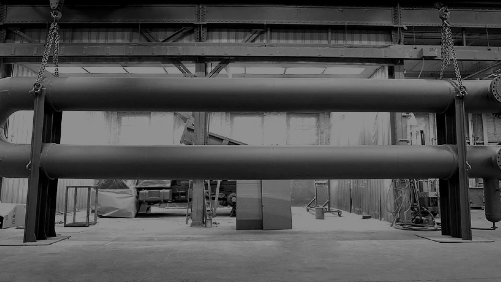 a large metal pipe in a warehouse