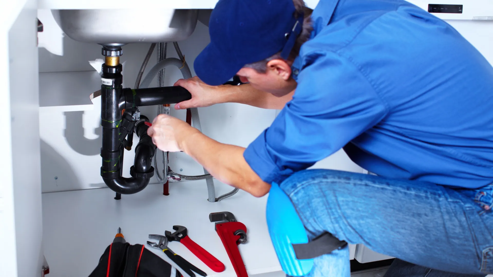 a man fixing a machine