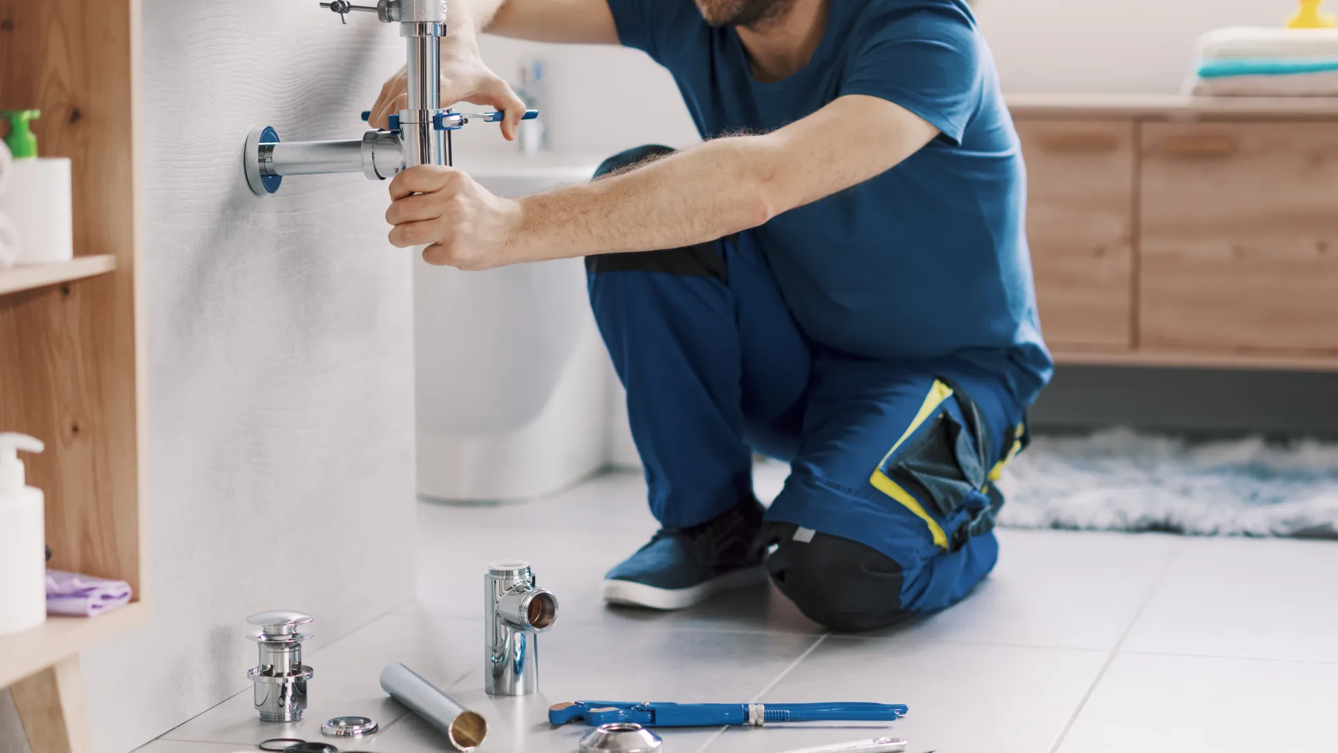 a man using a faucet
