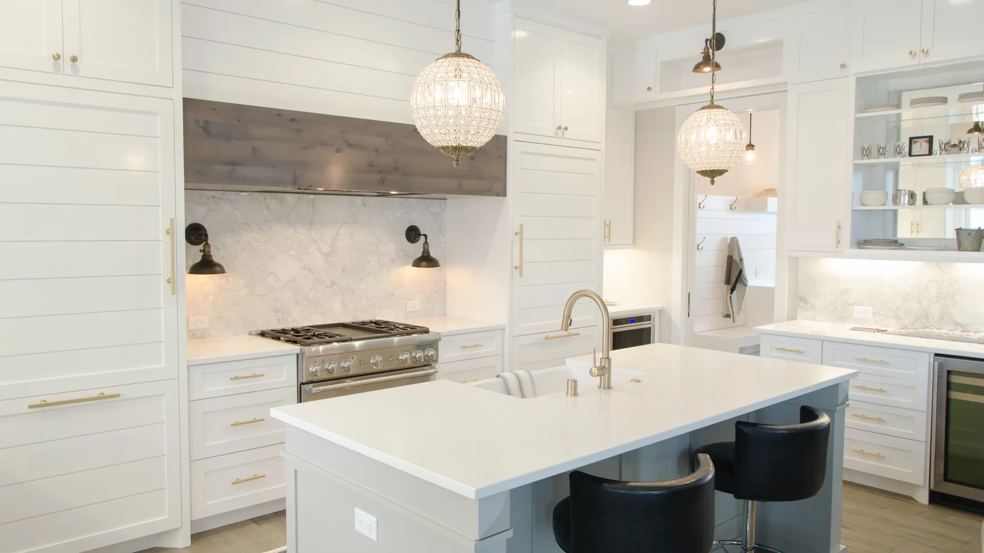 a kitchen with white cabinets