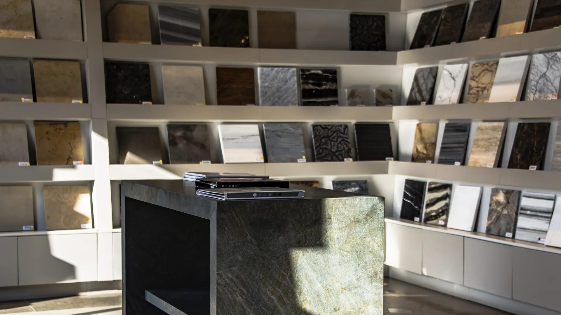 a showroom with shelves of stone samples