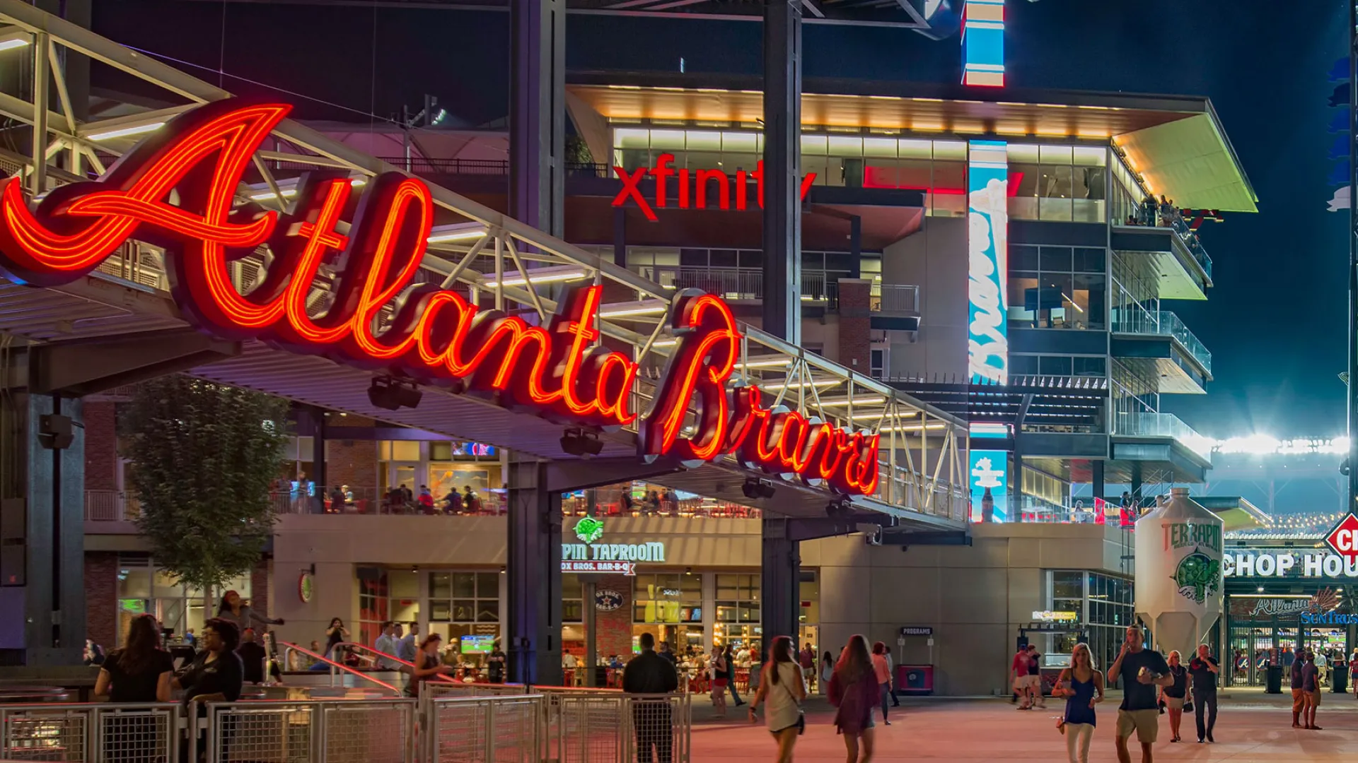 a large building with neon signs