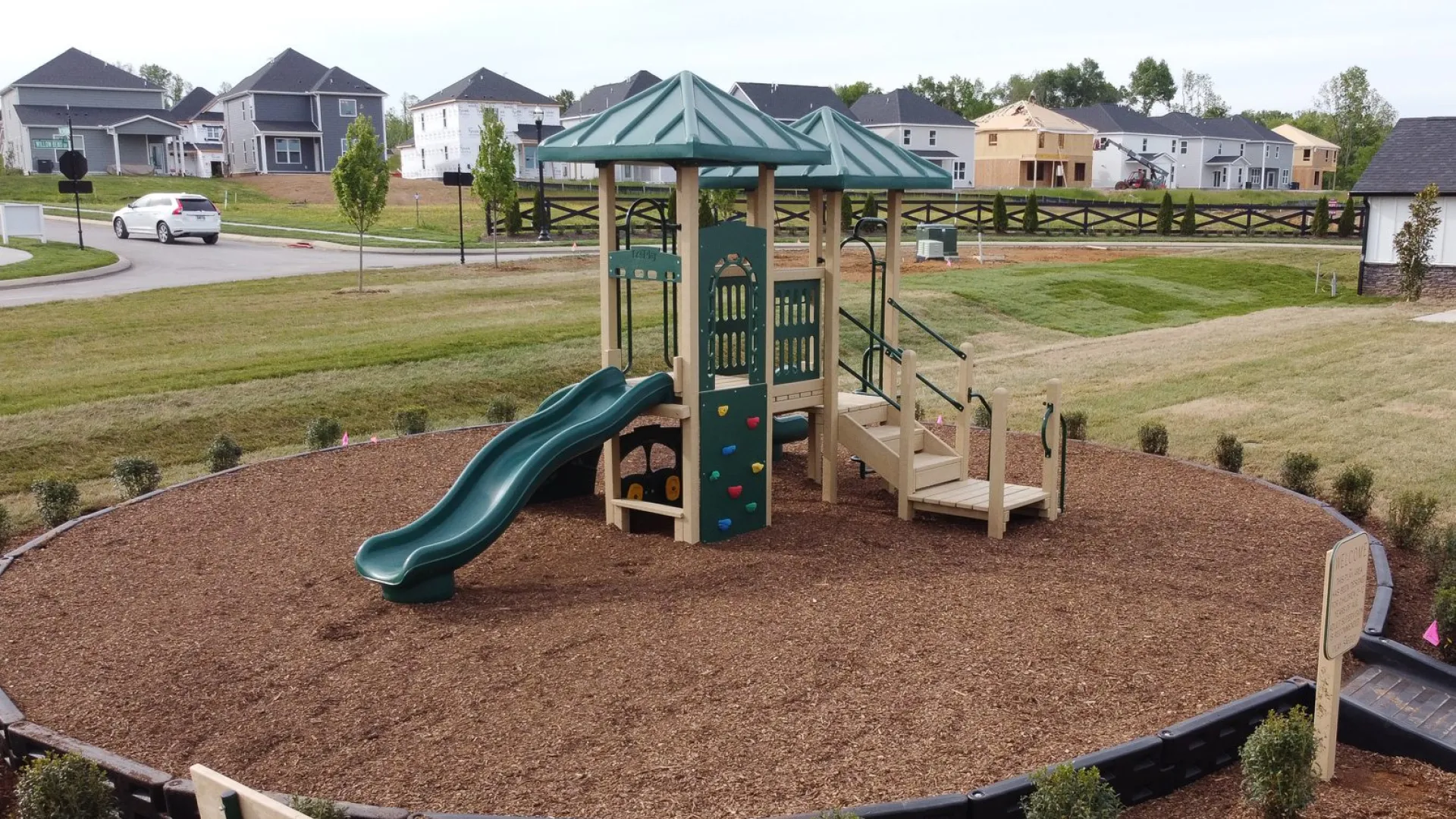 a small play structure in a yard