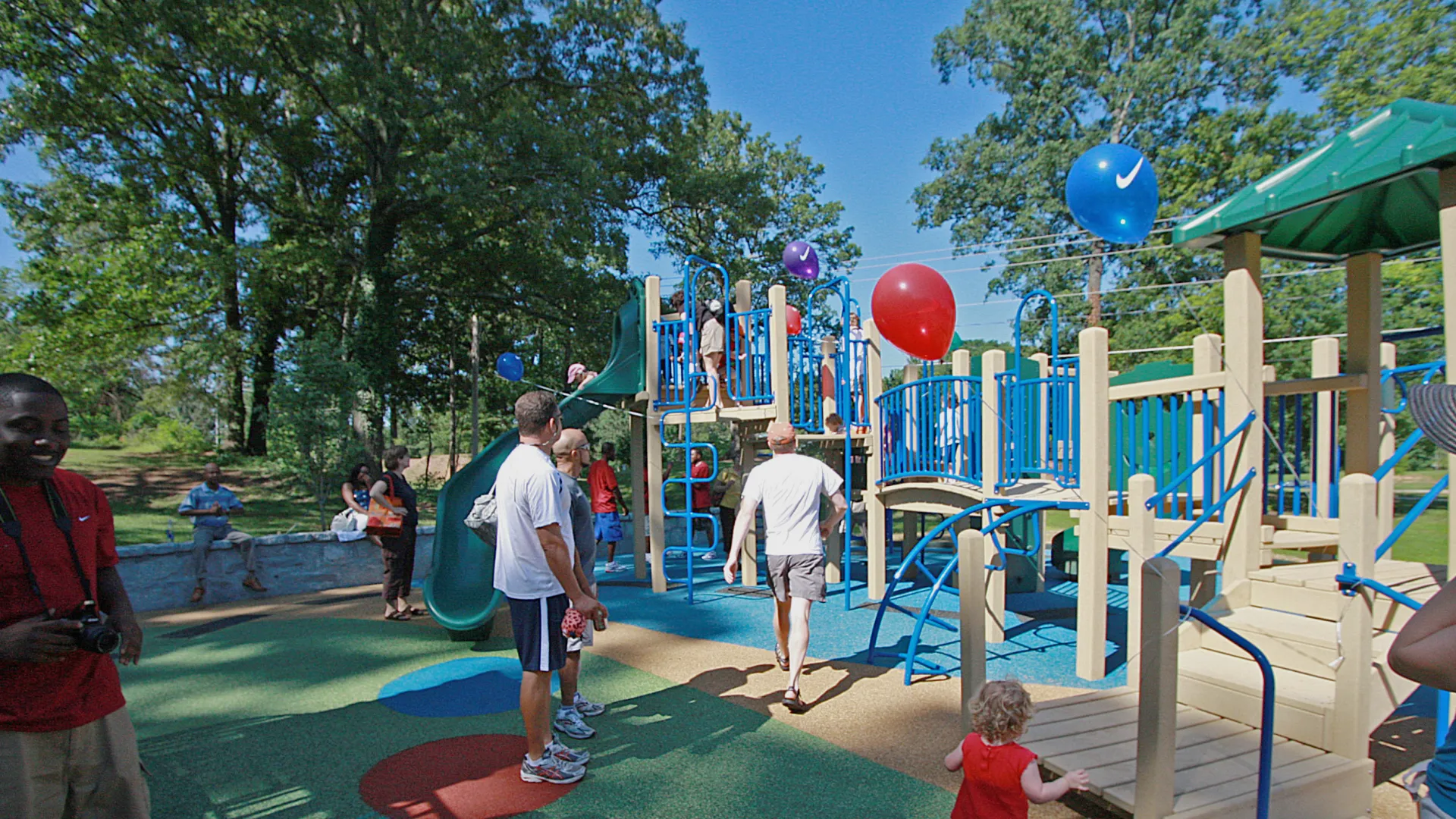 a group of people playing on a playground