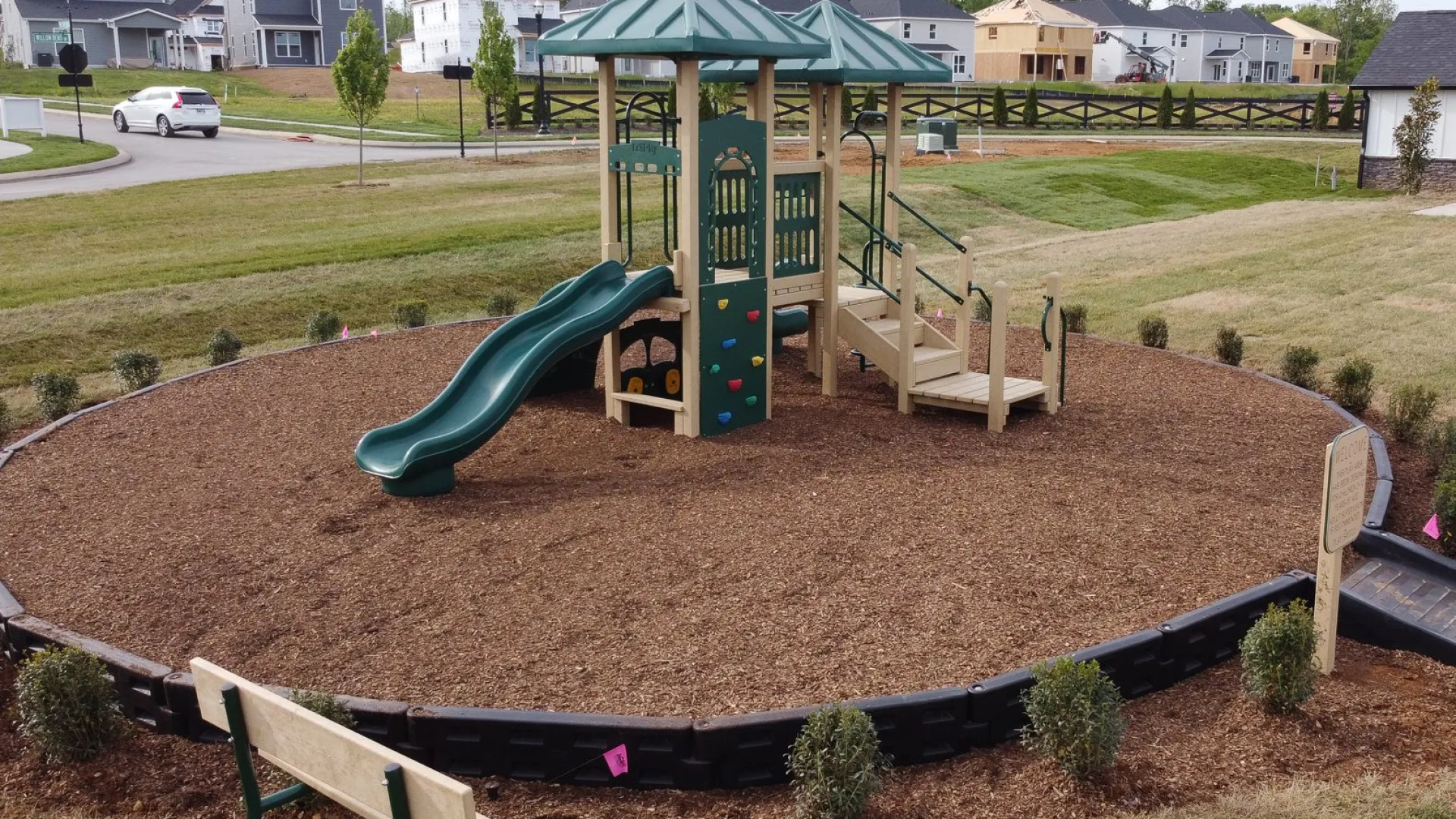 a small play structure in a yard