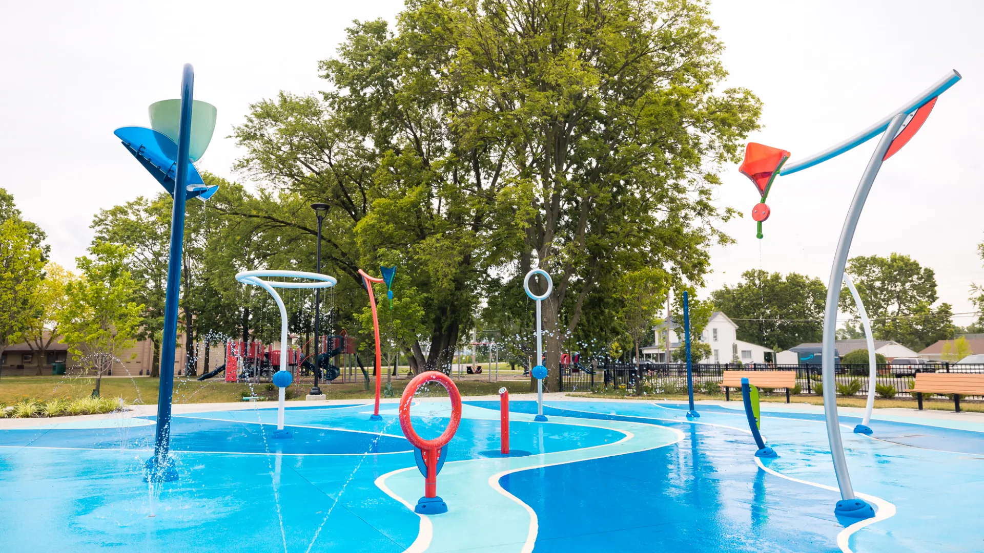 a pool with a slide and a slide in it