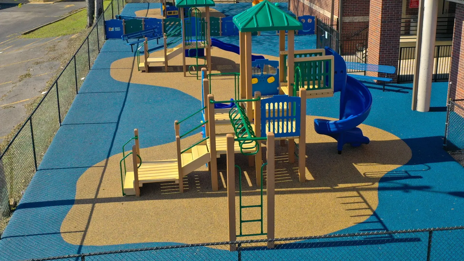 a playground with blue chairs