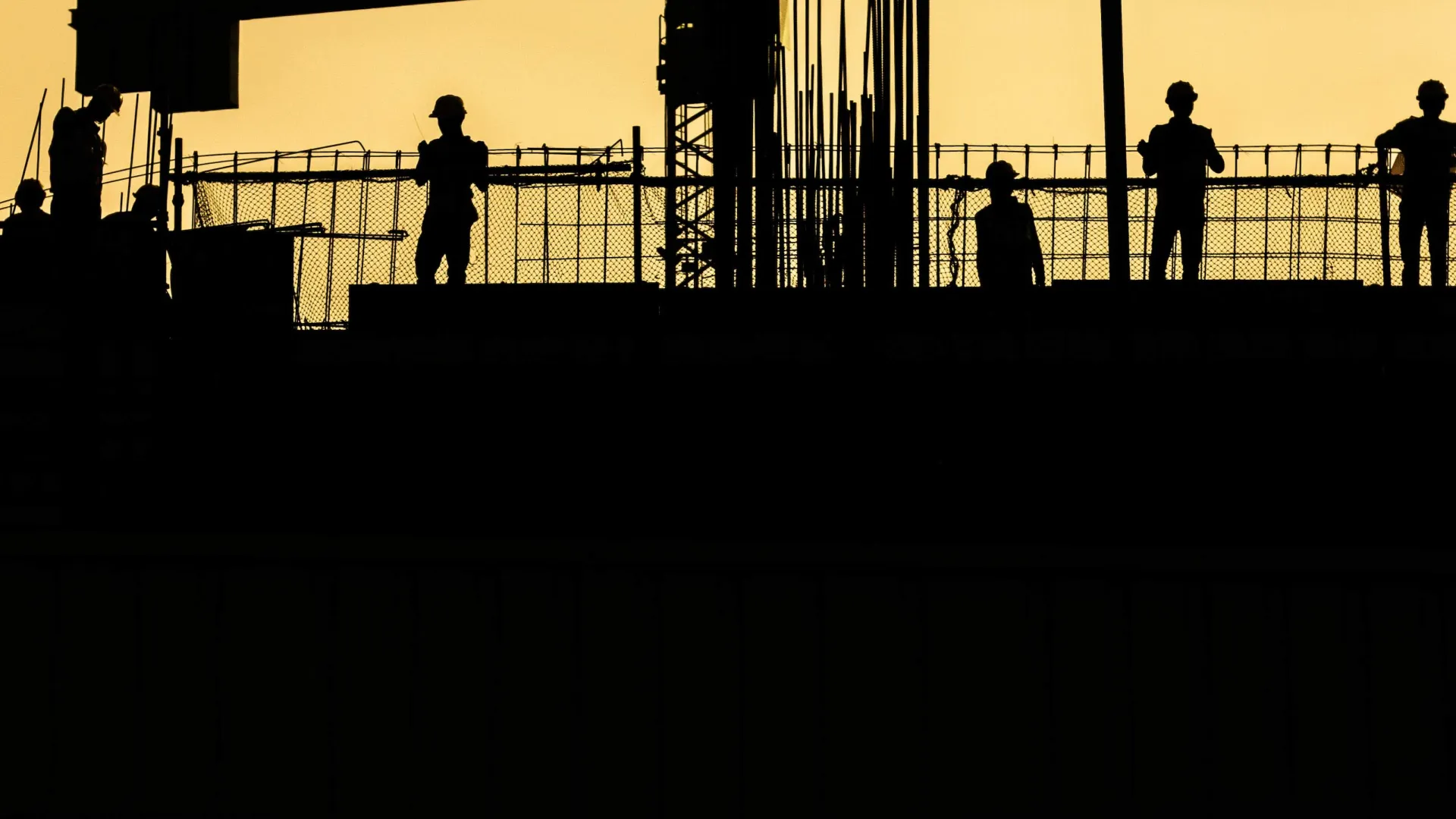 a group of people standing on a bridge