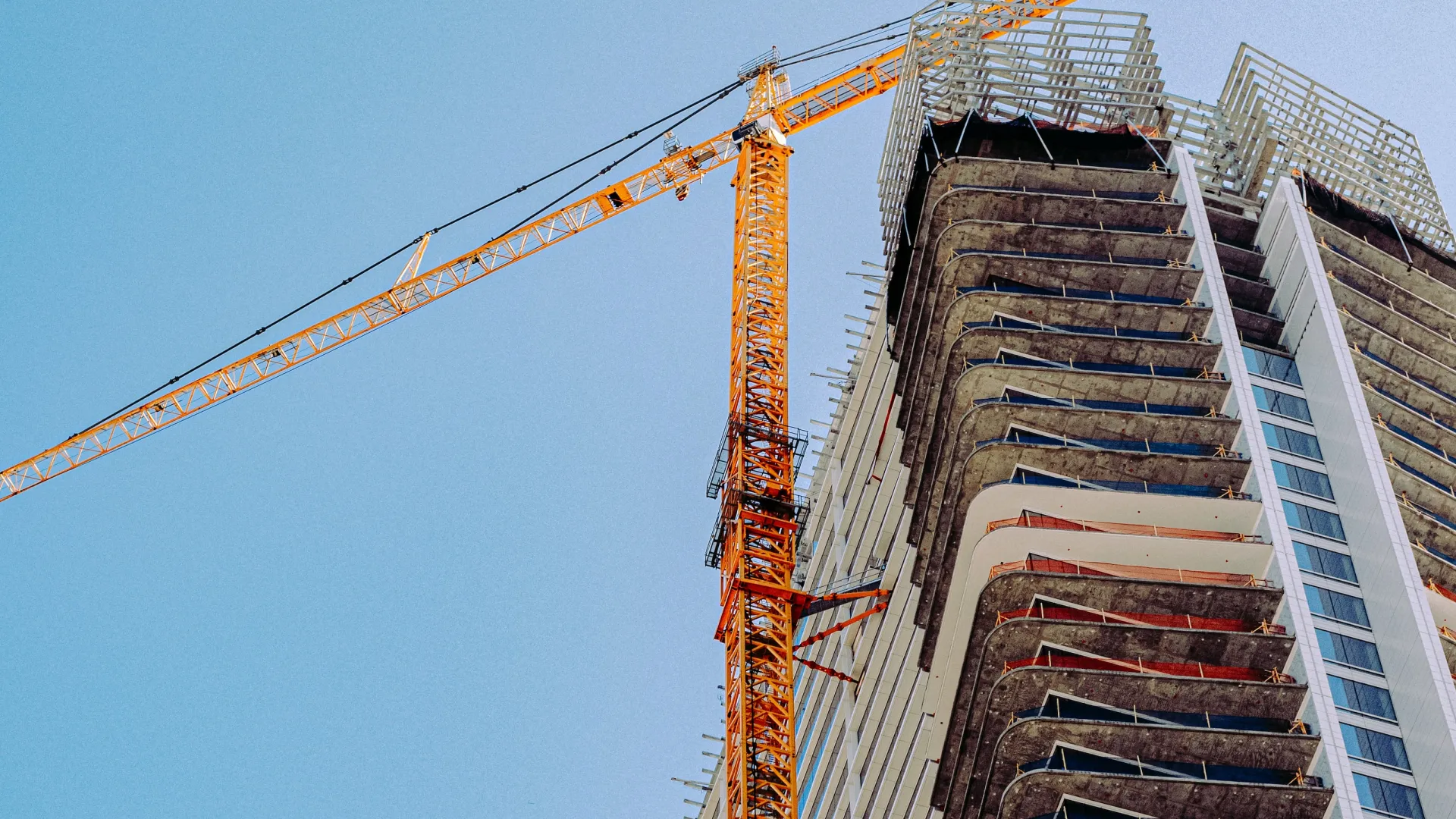 a crane lifting a building