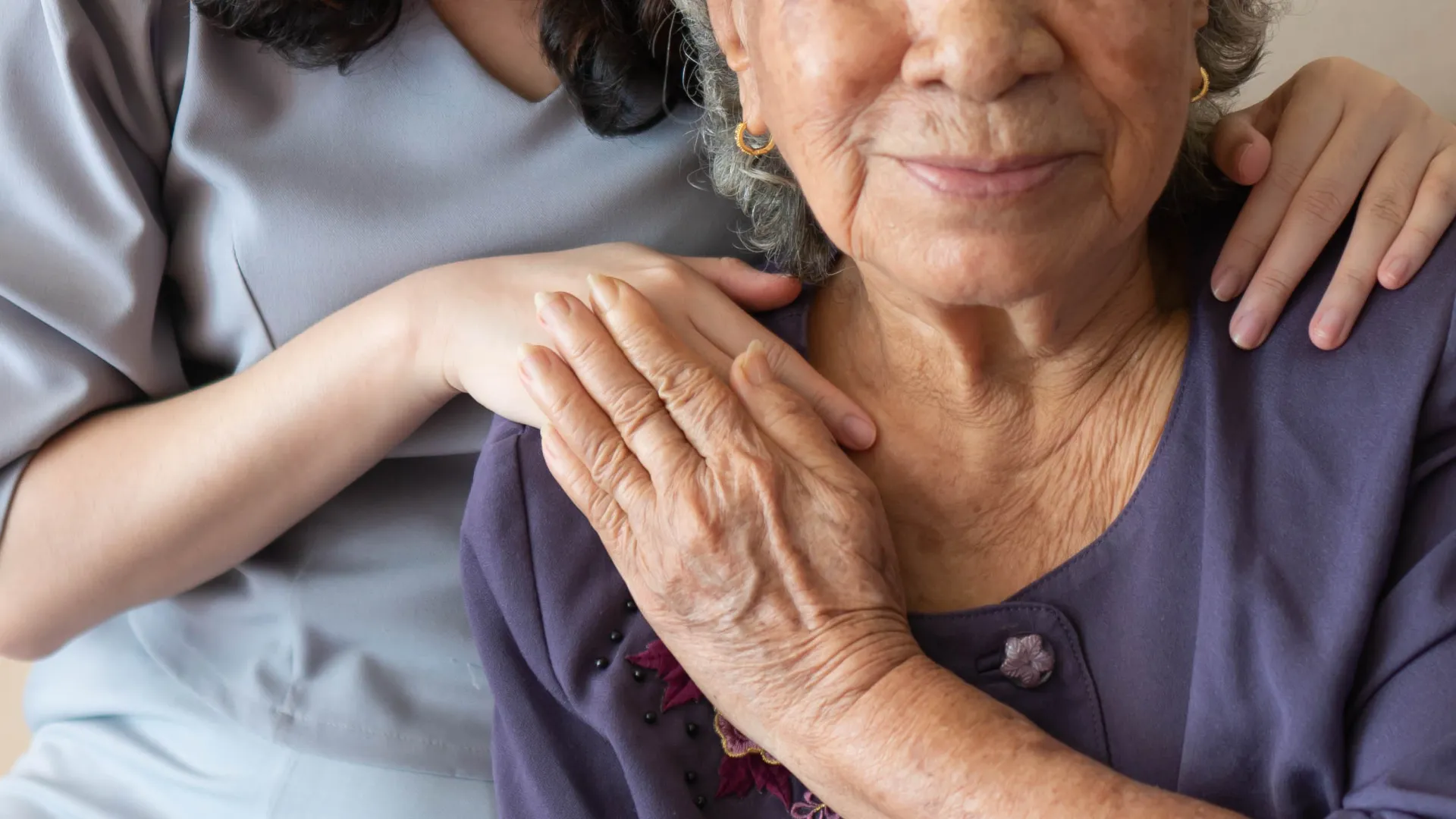 a person holding the hands together