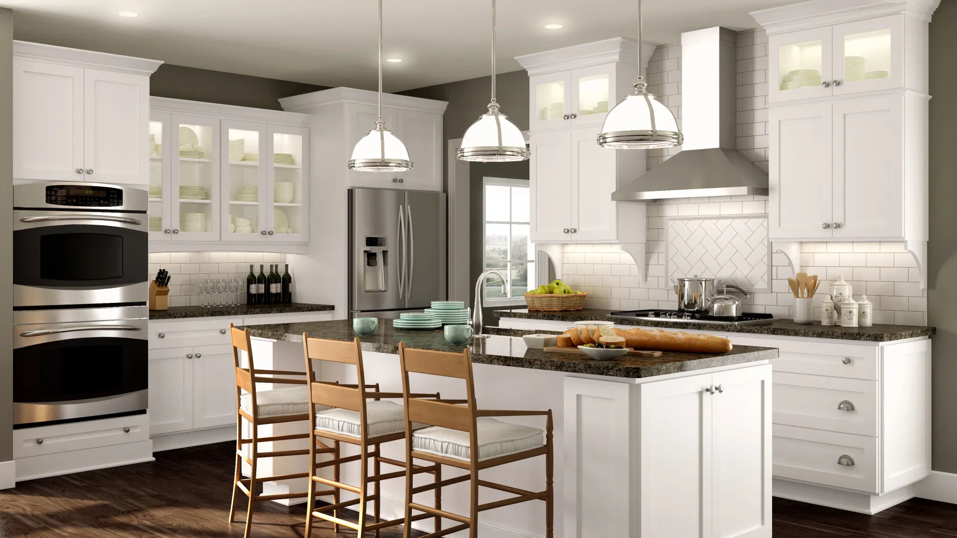 Modern white kitchen with island, wood flooring, stainless steel appliances, and pendant lighting above bar stools.