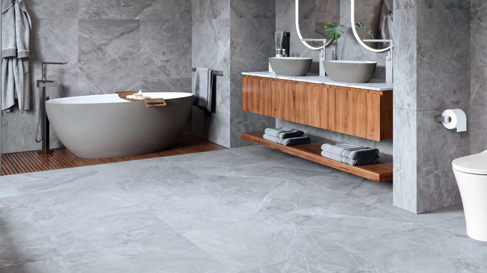 a bathroom with a tub sink and toilet
