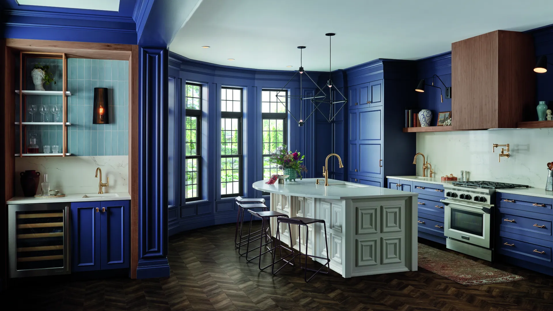a kitchen with blue cabinets