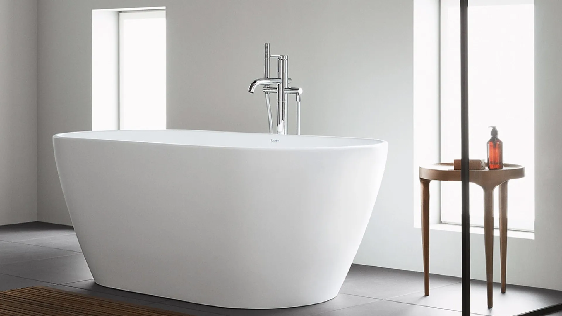 a white bathtub in a bathroom
