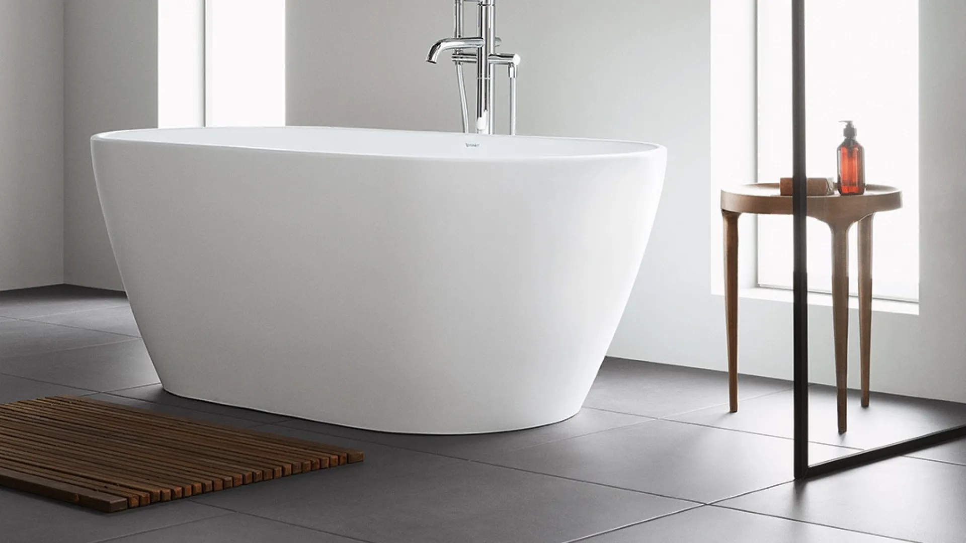 a white bathtub in a bathroom