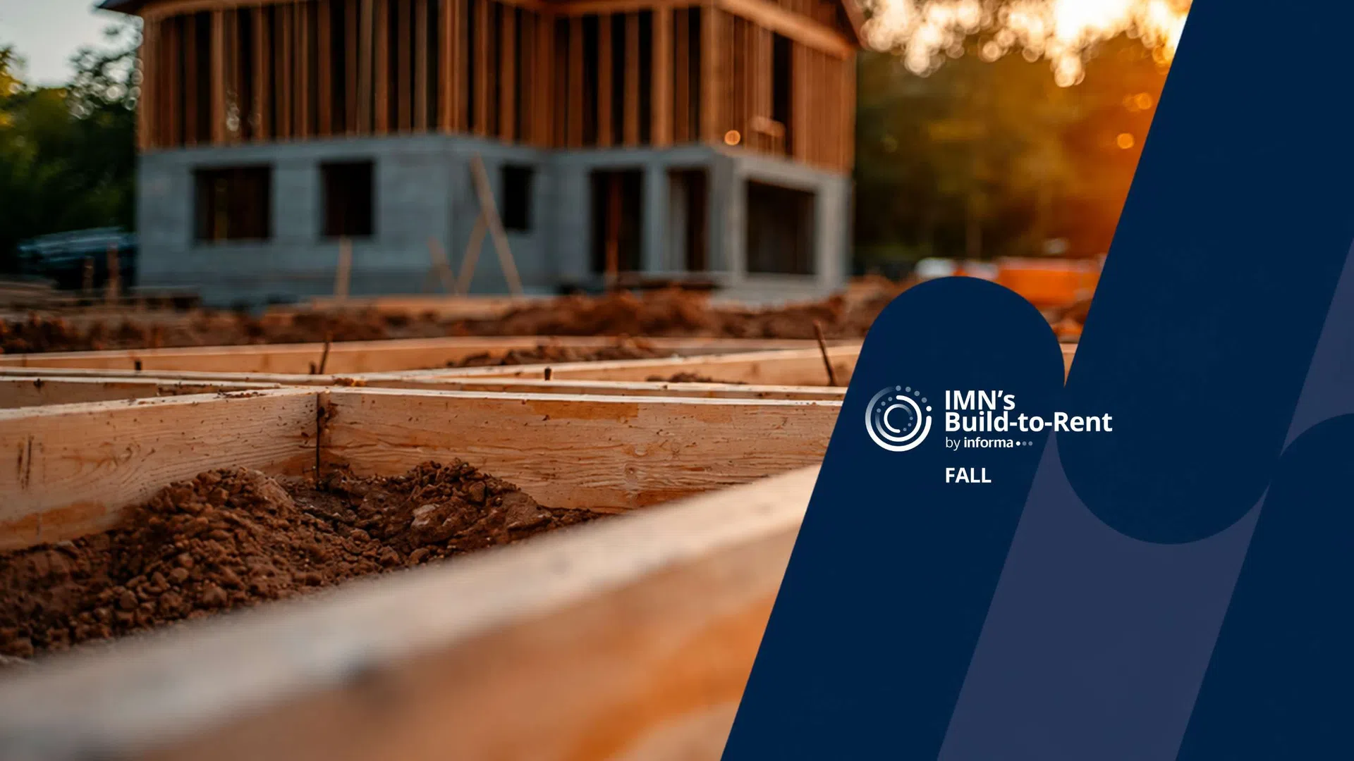 Construction site with wooden framework and partially built house during sunset, featuring IMN Build-to-Rent branding.