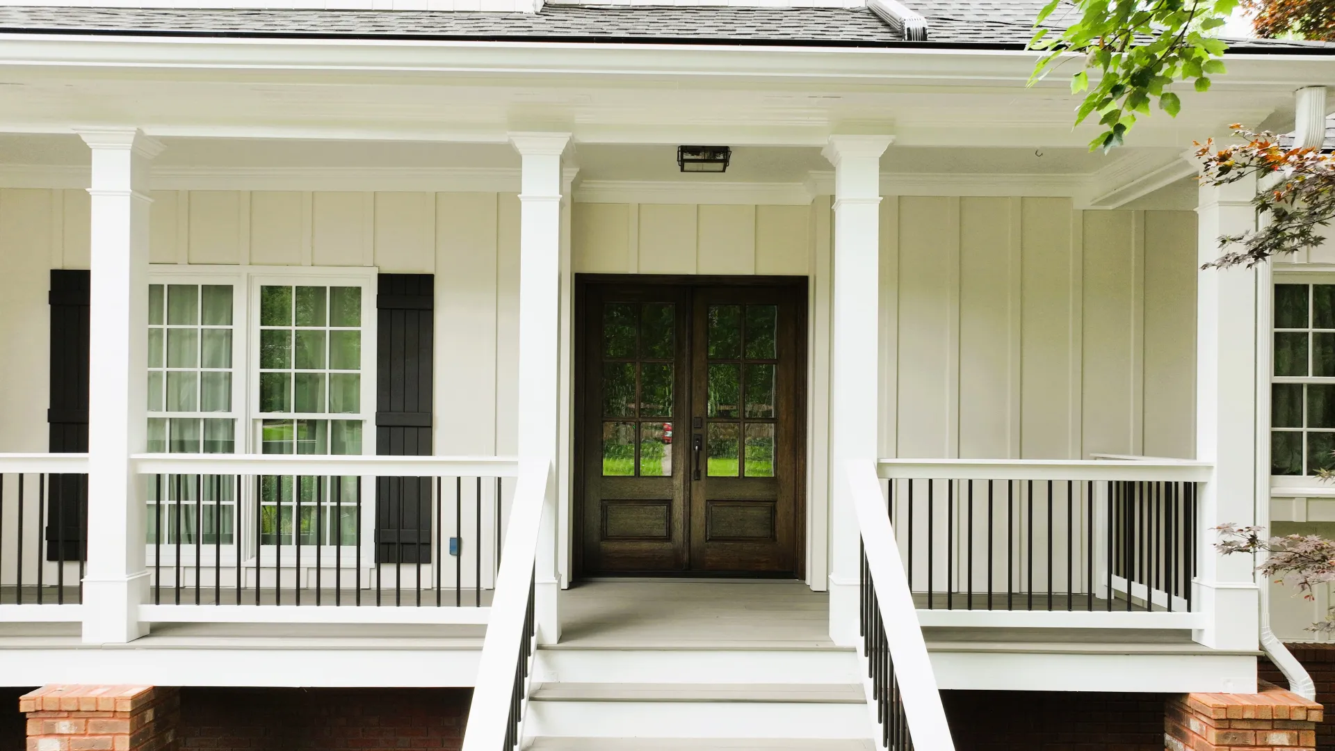 a white house with a porch