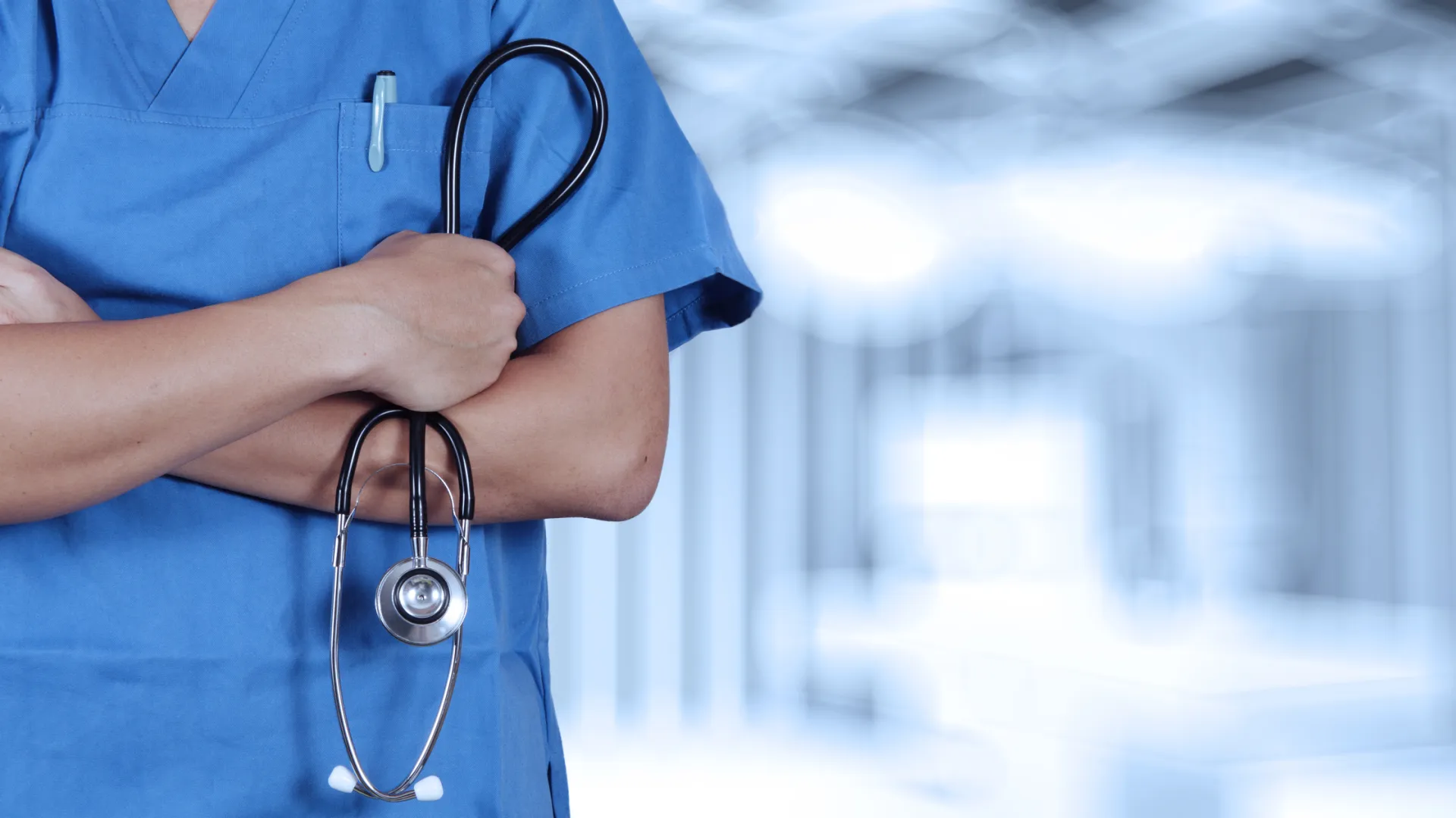 a close-up of a doctor holding a stethoscope