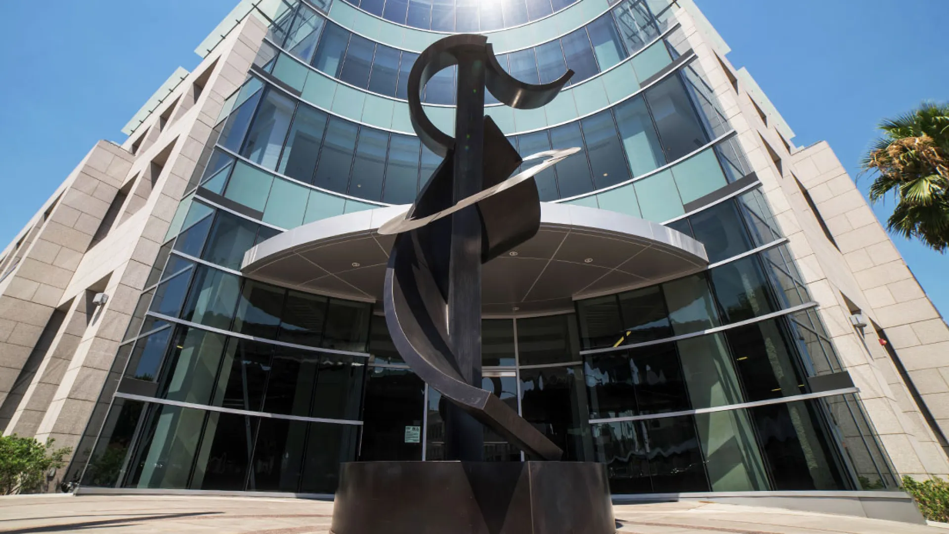 a statue in front of a building