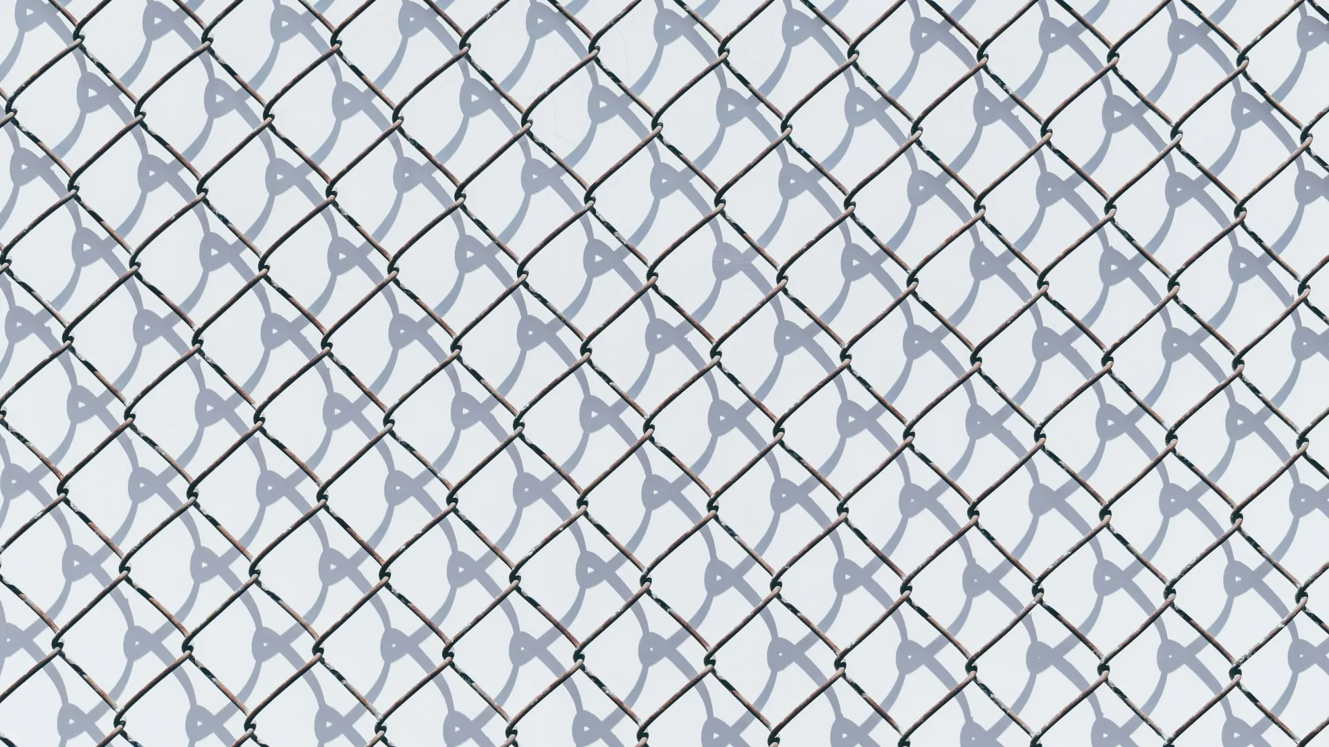 a close up of a chain link fence