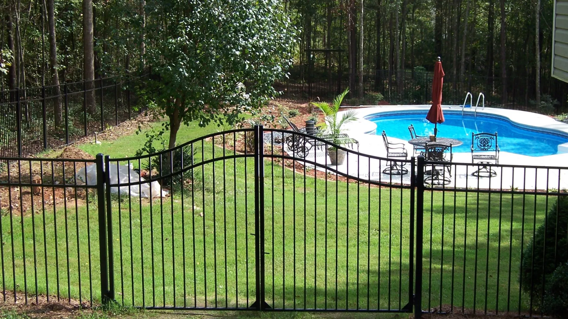 a swimming pool in a backyard