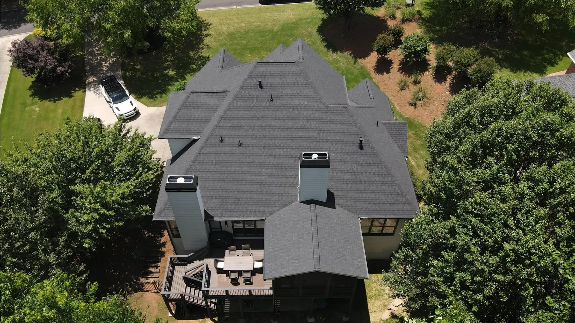 a house with a car parked in the driveway