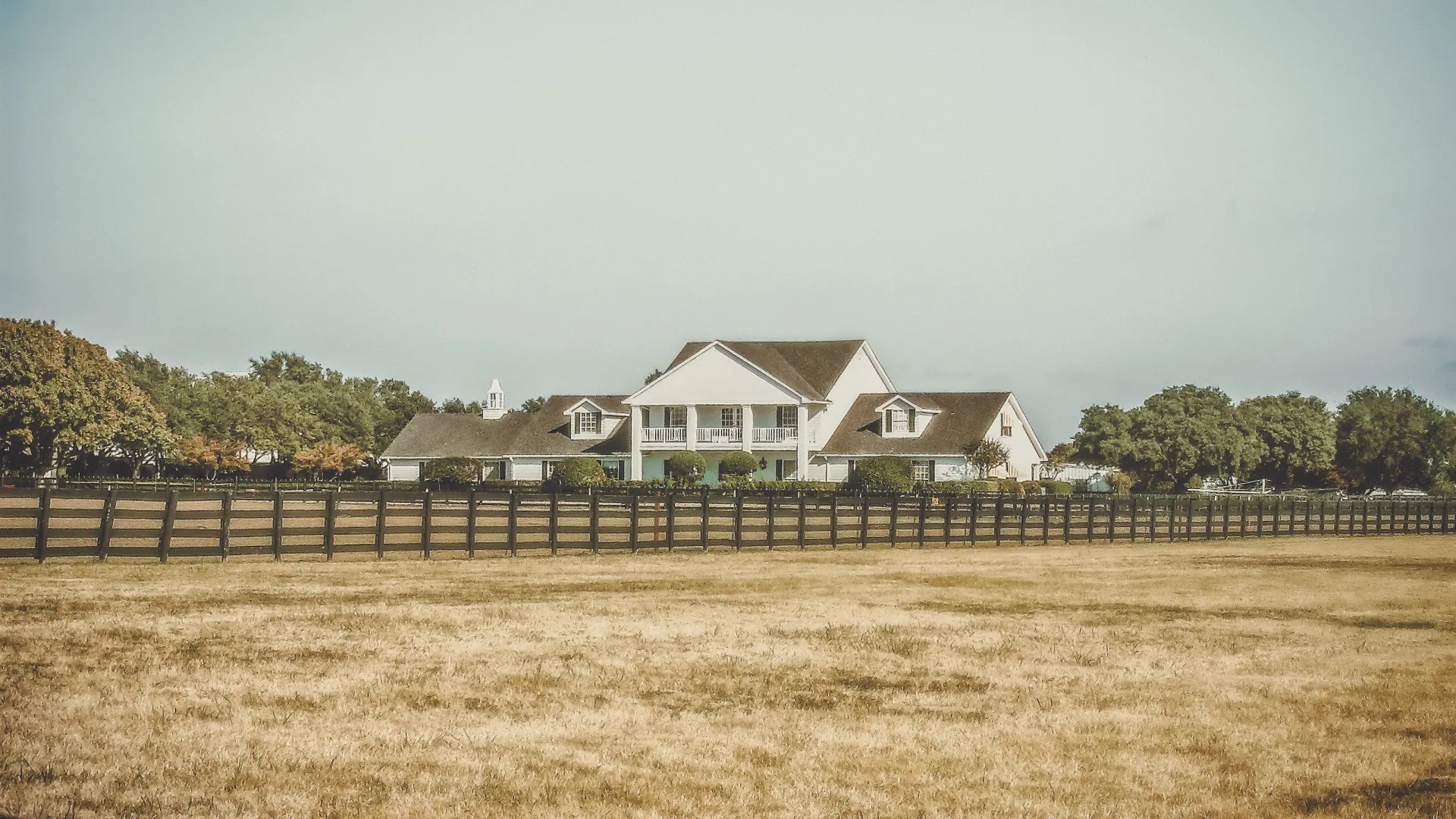 texas house behind a fence