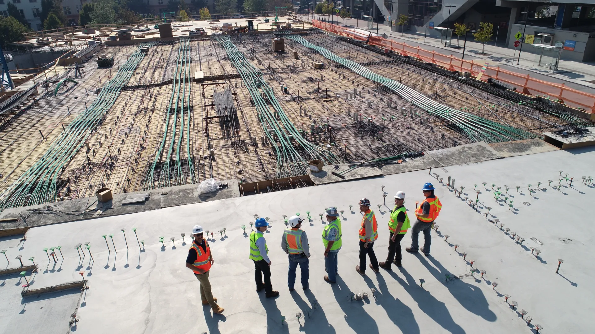 a group of people standing on a large roof