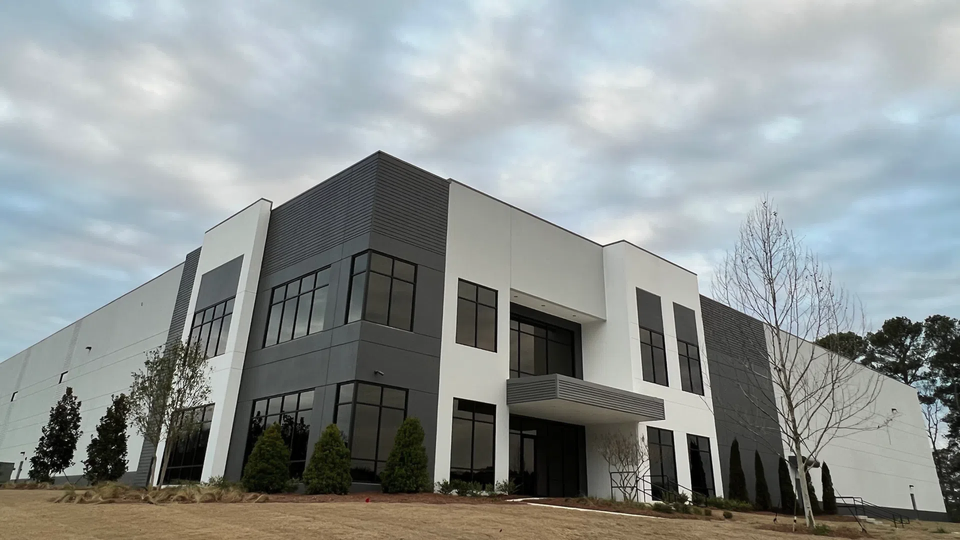 office building with trees in the front
