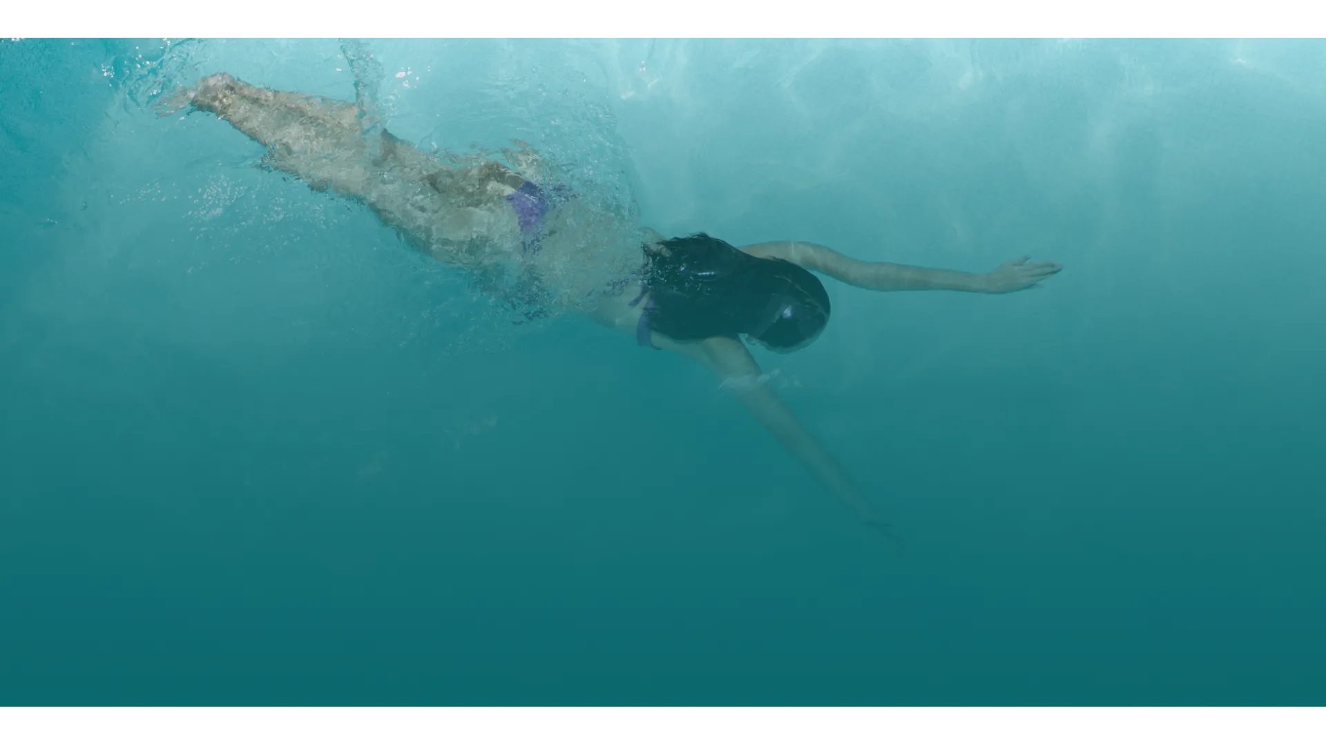 a person swimming in water