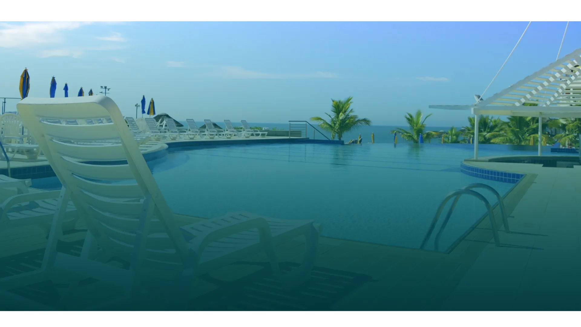 a white lounge chair on a table