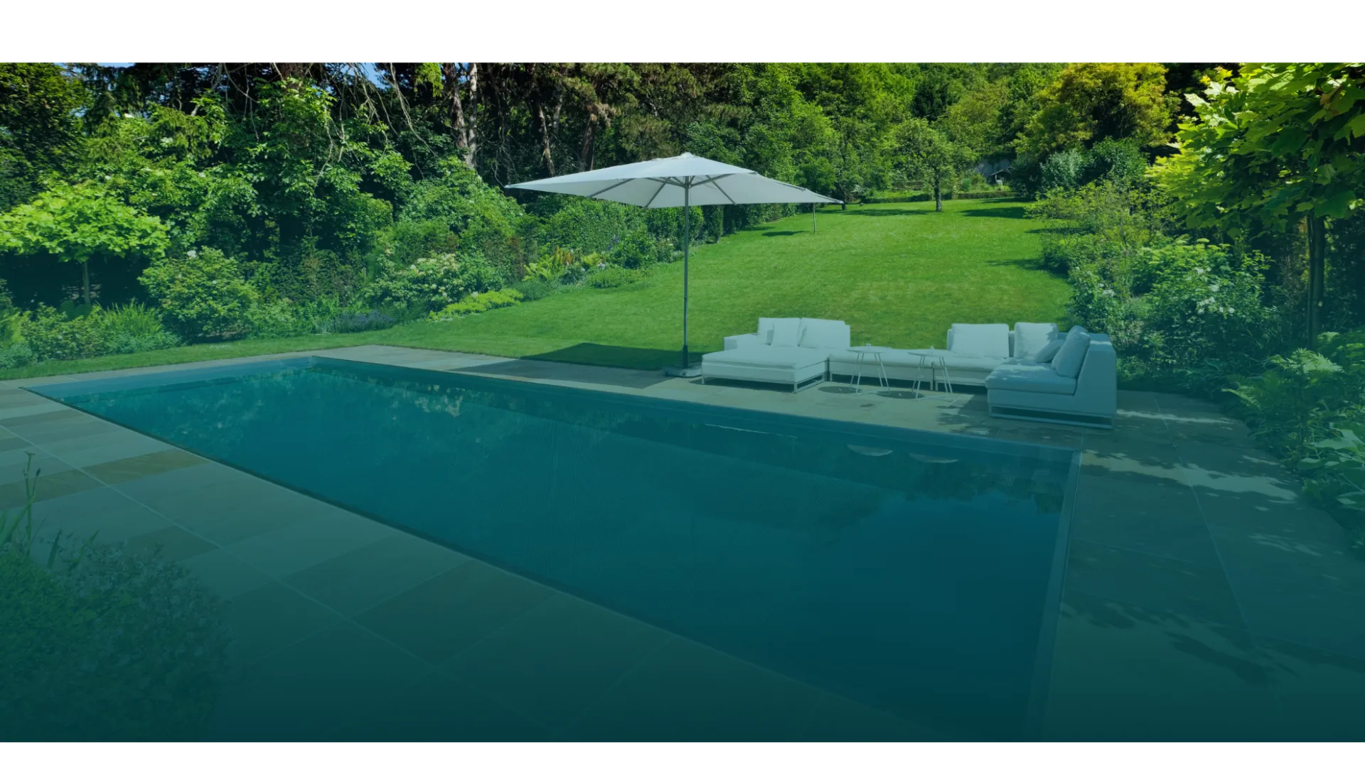 a pool with a lounge chair and umbrella