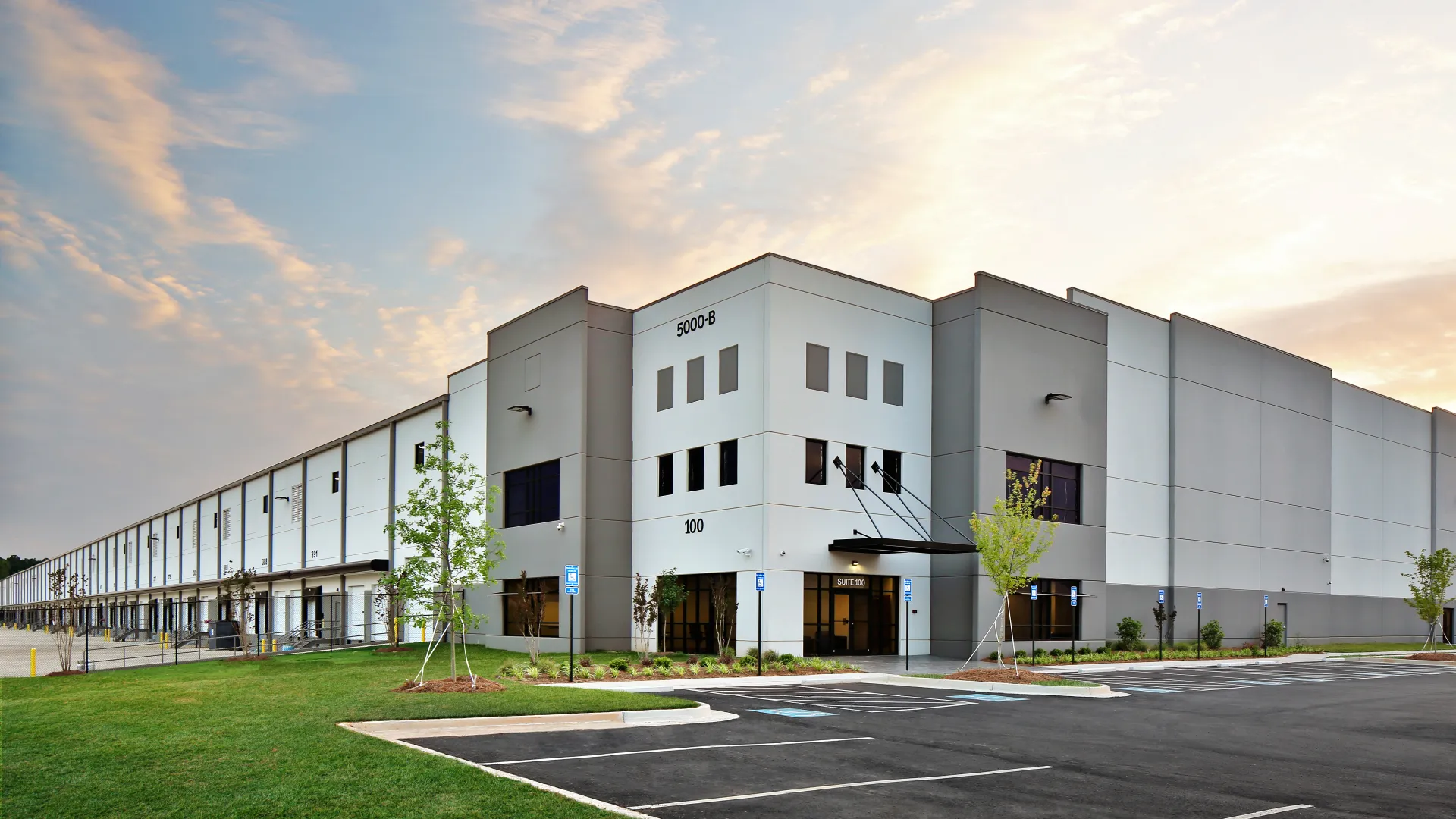 a building with a parking lot