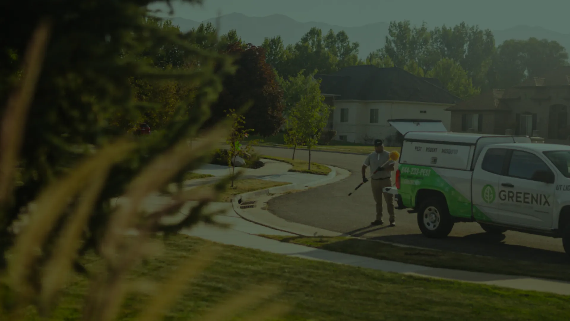 Pest Technician getting equipment from truck