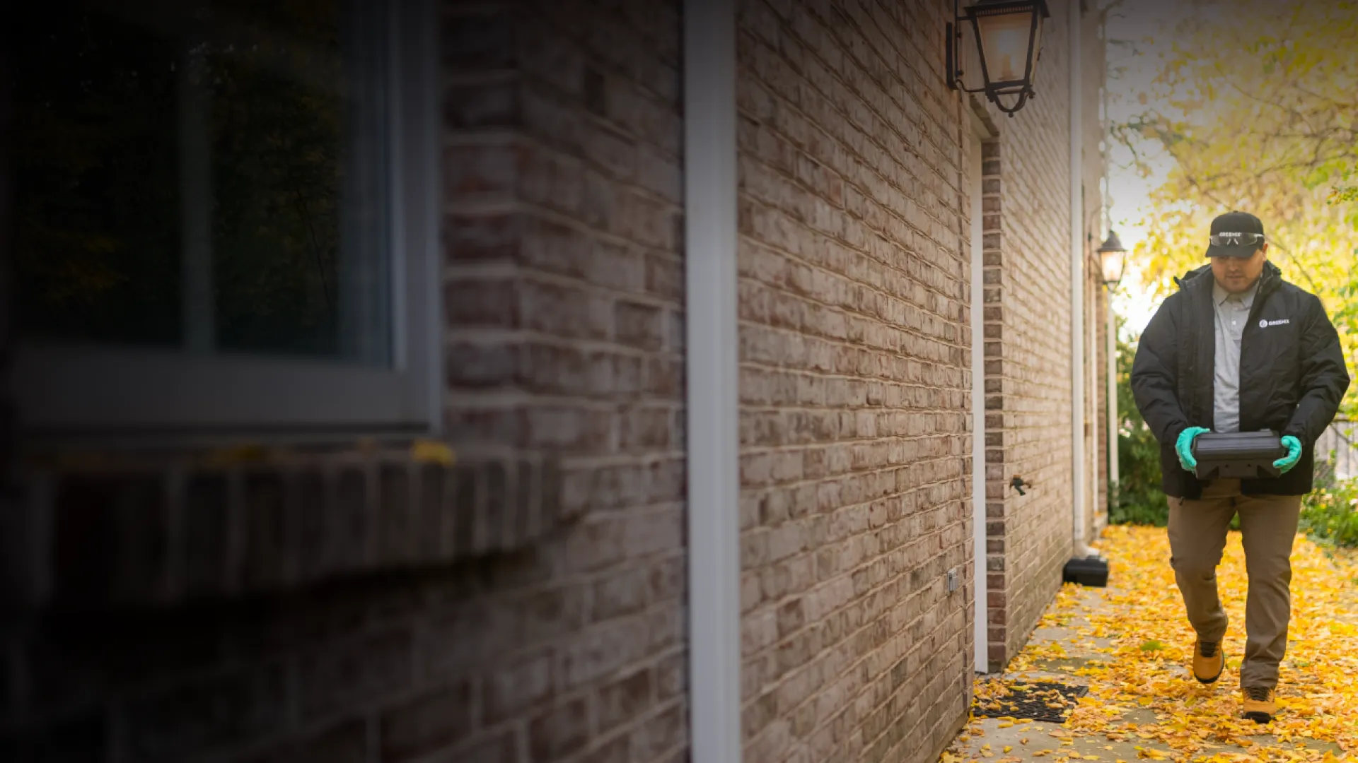 a man walking on a sidewalk