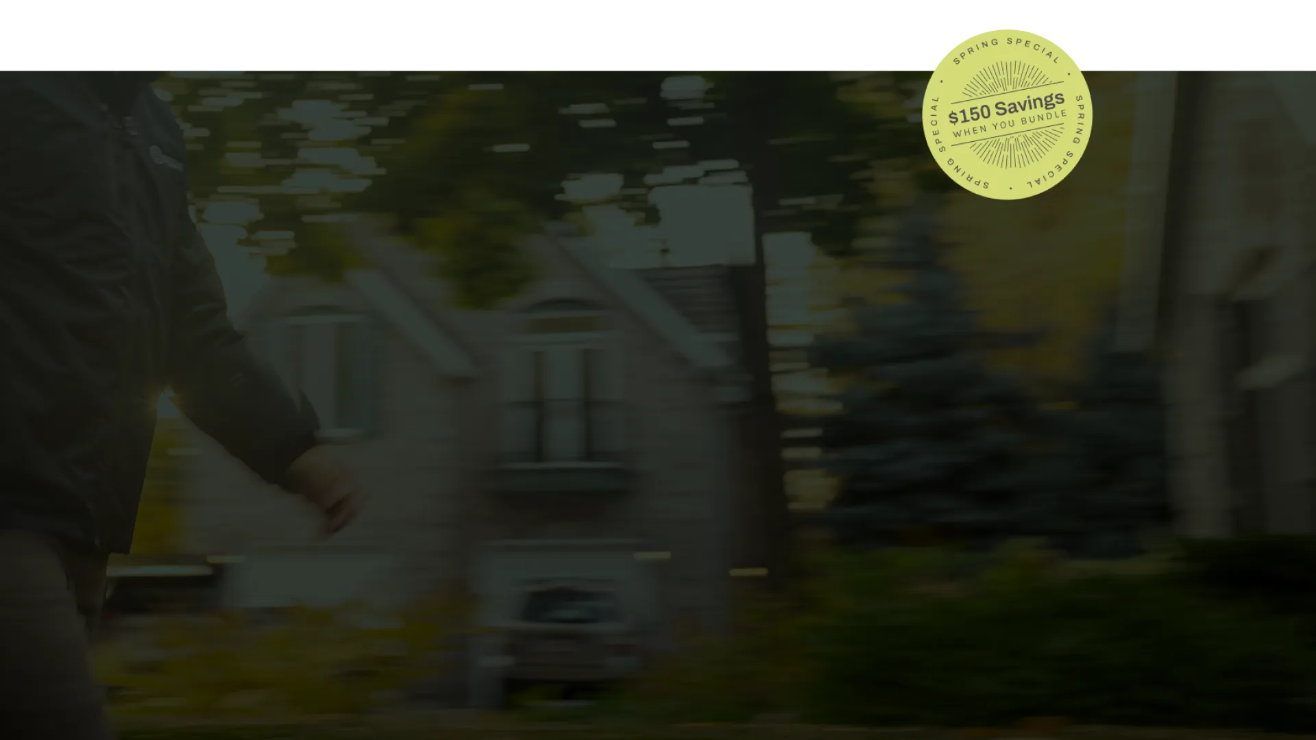 Person walking outside a house holding a magazine with a $150 savings special offer sticker