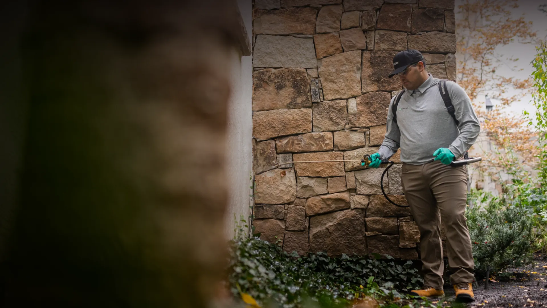 Pest Technician spraying for pests