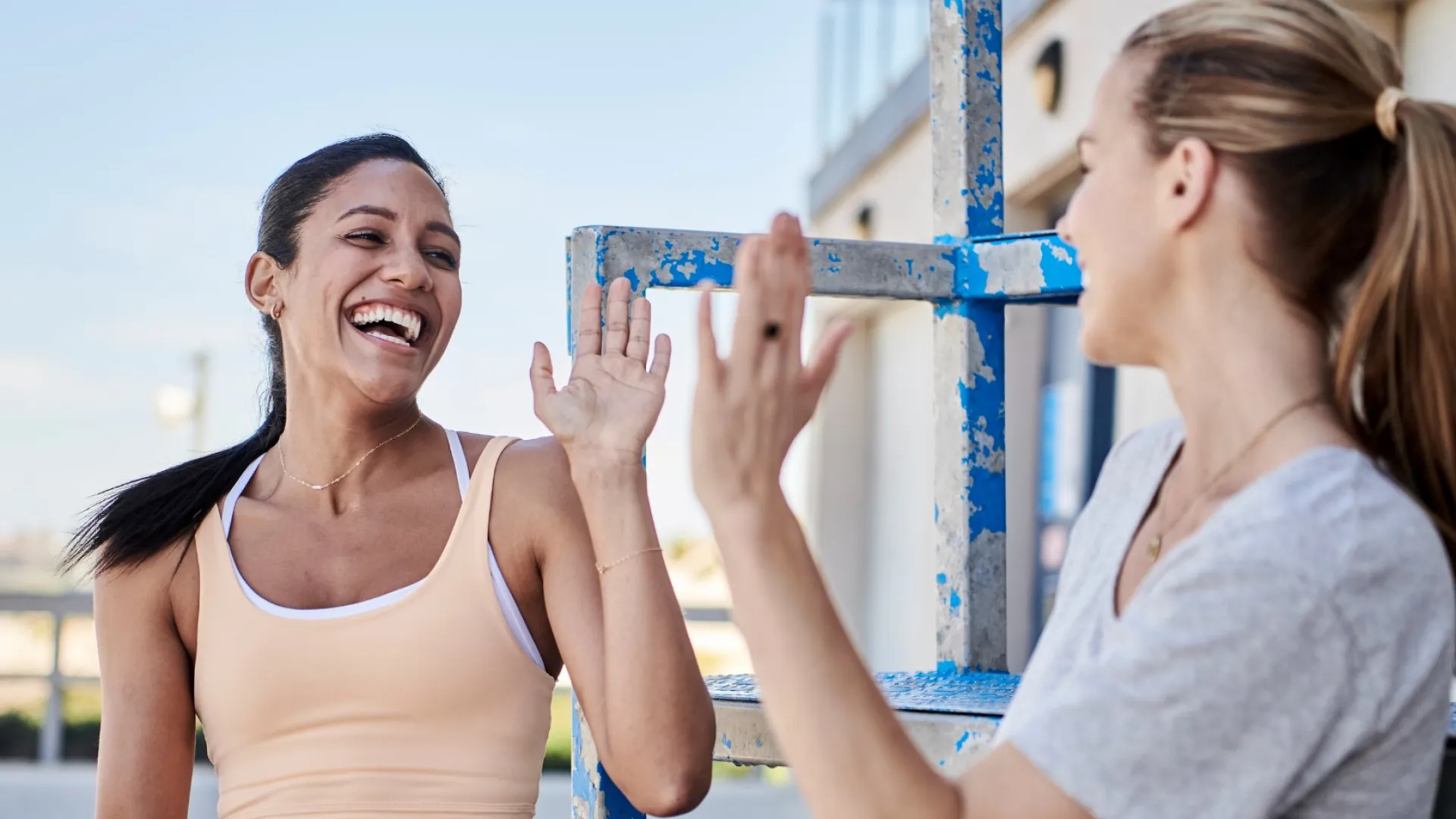 two women waive to each other