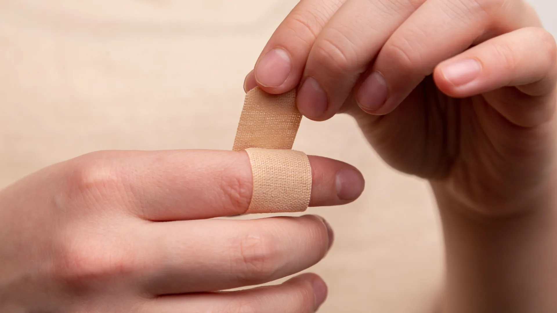 a hand holding a piece of paper