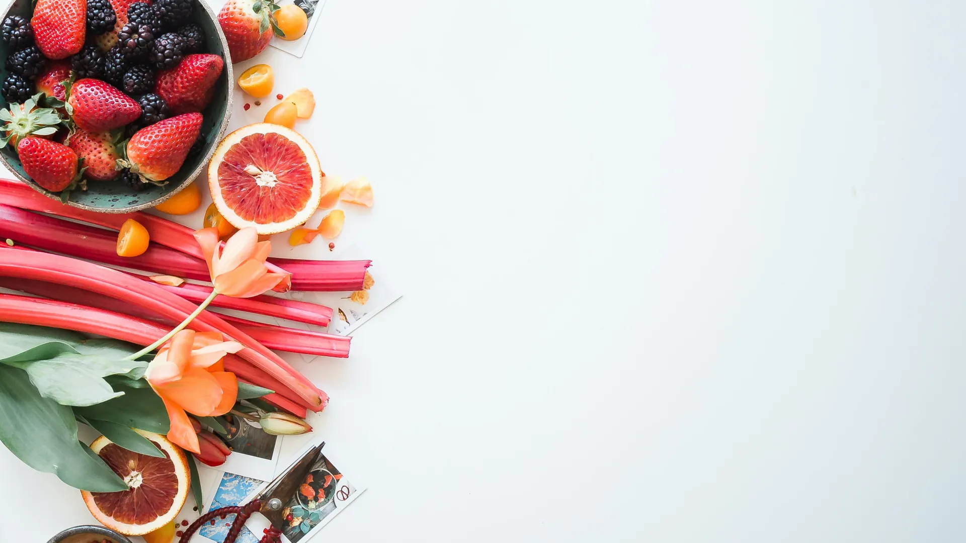 a bowl of fruit on a table