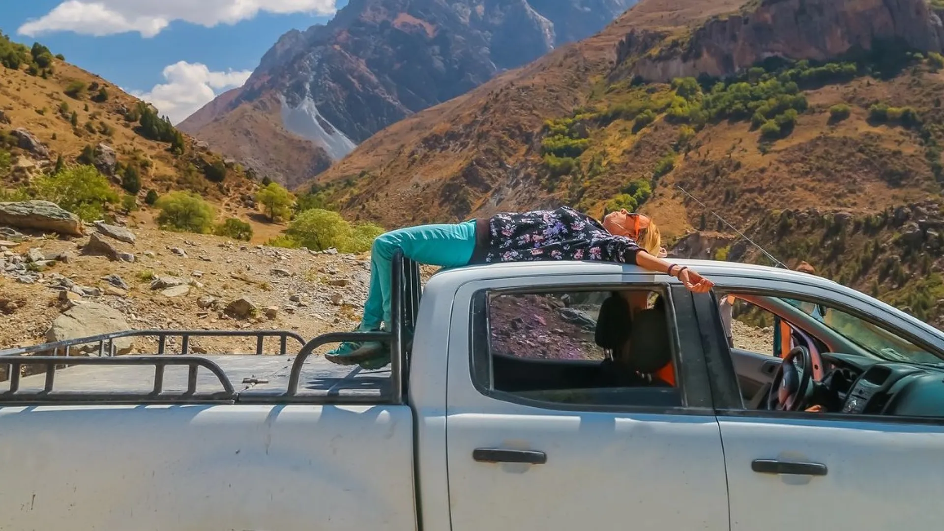 a truck parked in the mountains