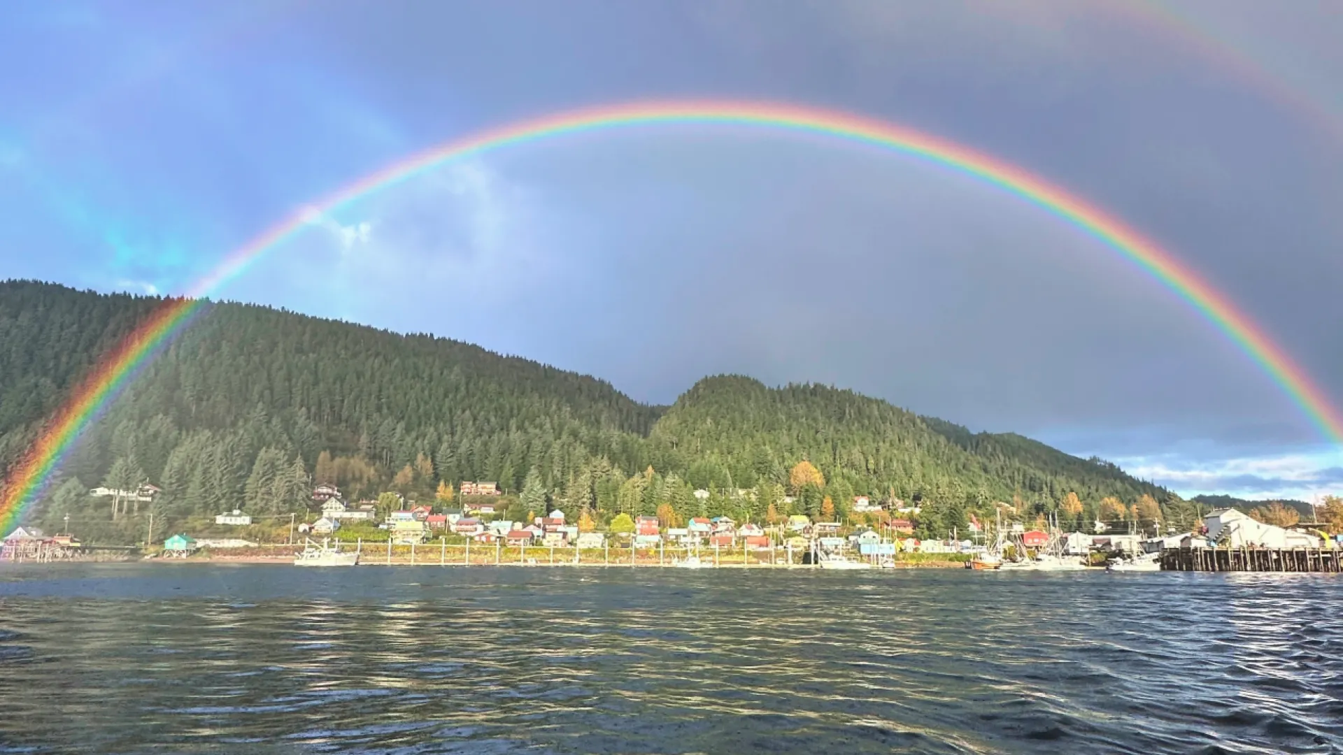 a rainbow over a town