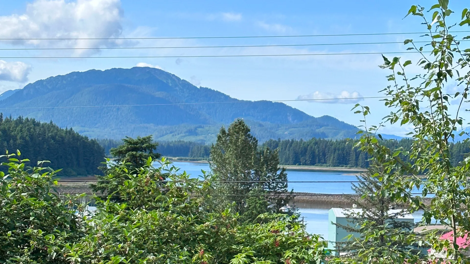 a view of a lake and mountains