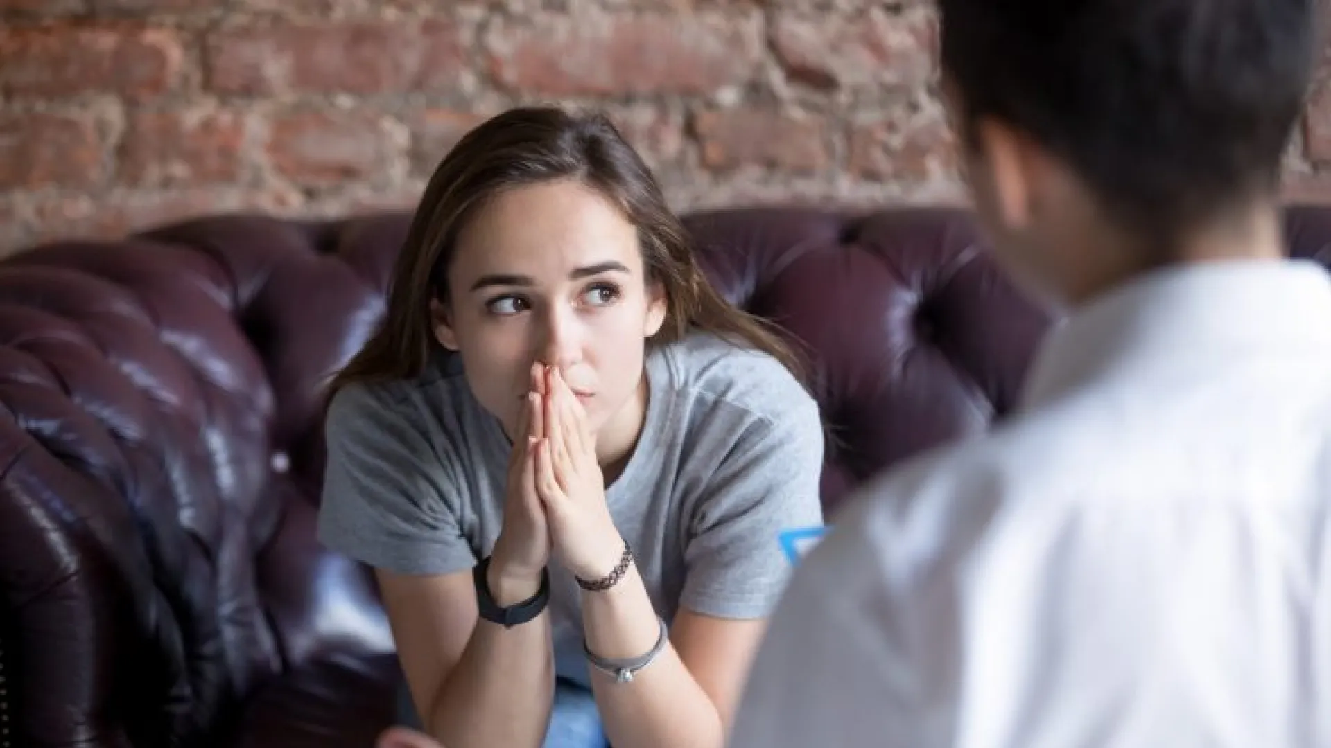 a person sitting on a couch