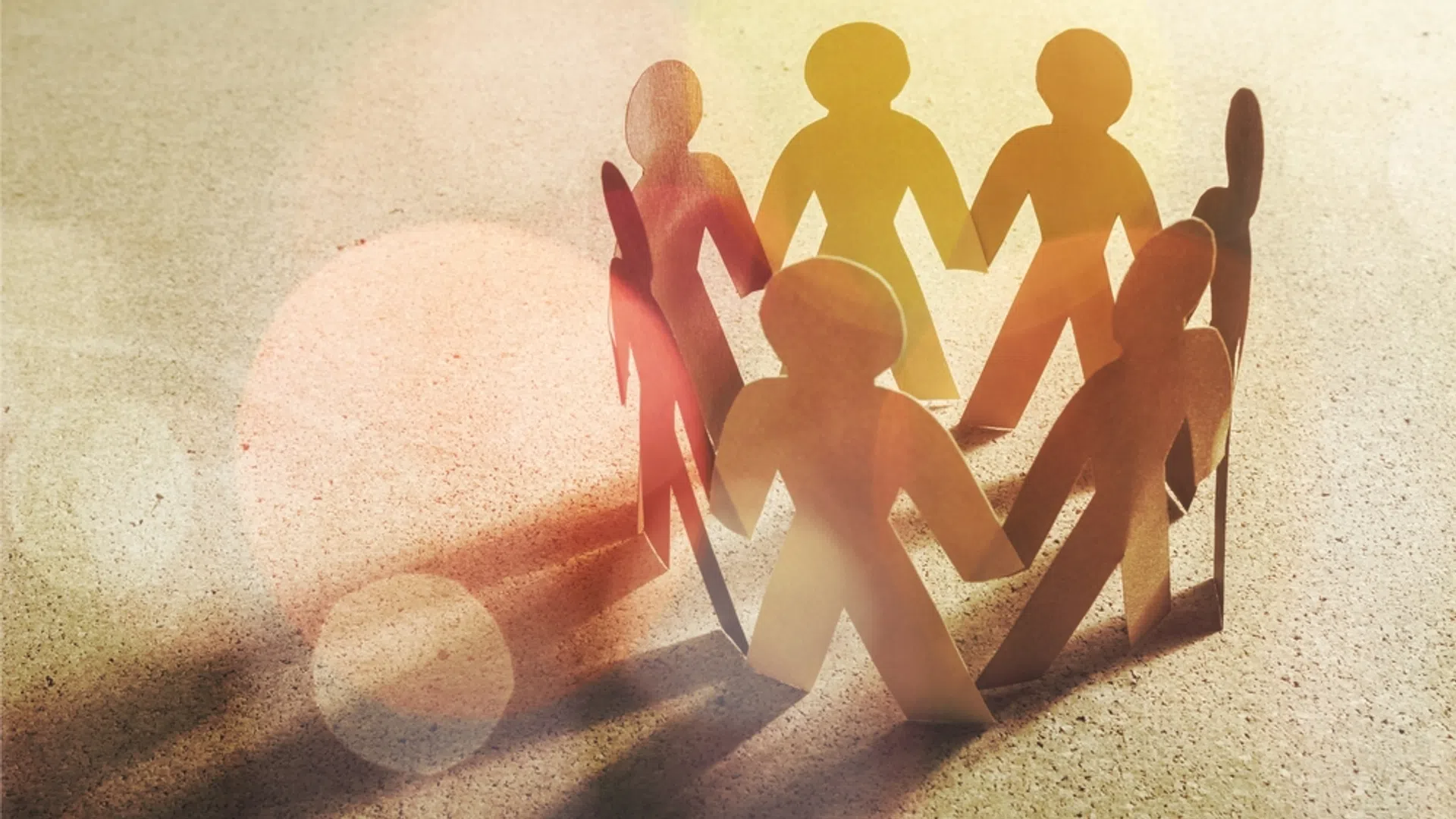 a group of people sitting on a circle
