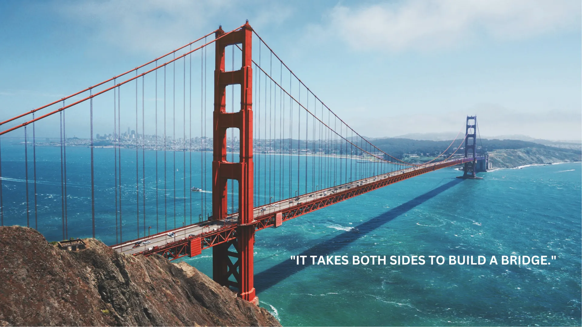 a large red bridge over water with Golden Gate Bridge in the background