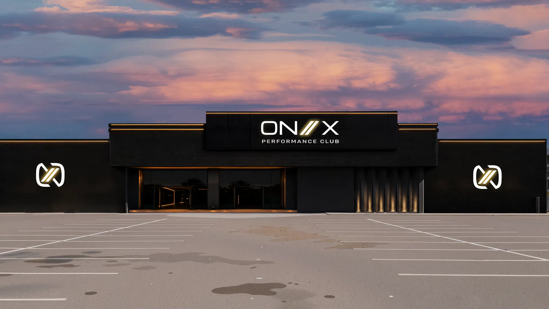 Exterior of ONYX Performance Club building at sunset with empty parking lot and dramatic sky.