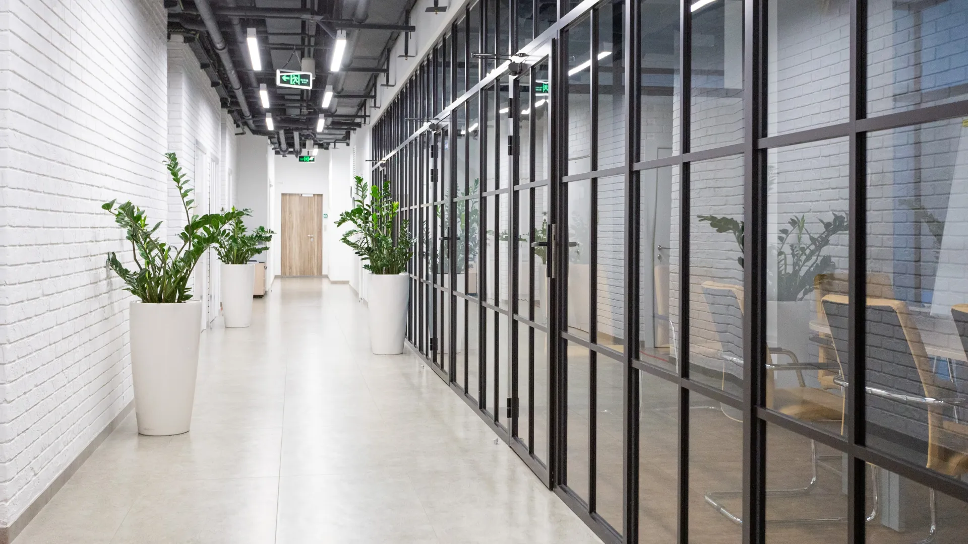 a hallway with glass walls